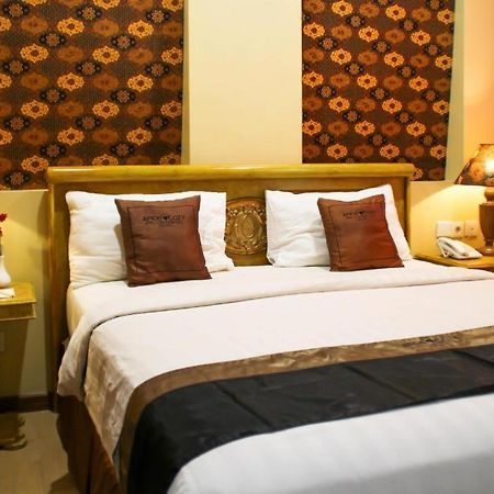 Amos Cozy Hotel Melawai Джакарта Экстерьер фото