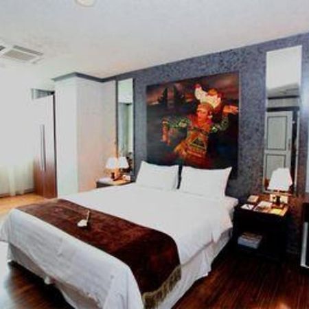 Amos Cozy Hotel Melawai Джакарта Экстерьер фото