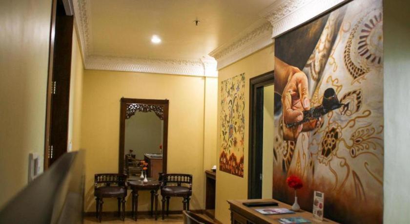 Amos Cozy Hotel Melawai Джакарта Экстерьер фото