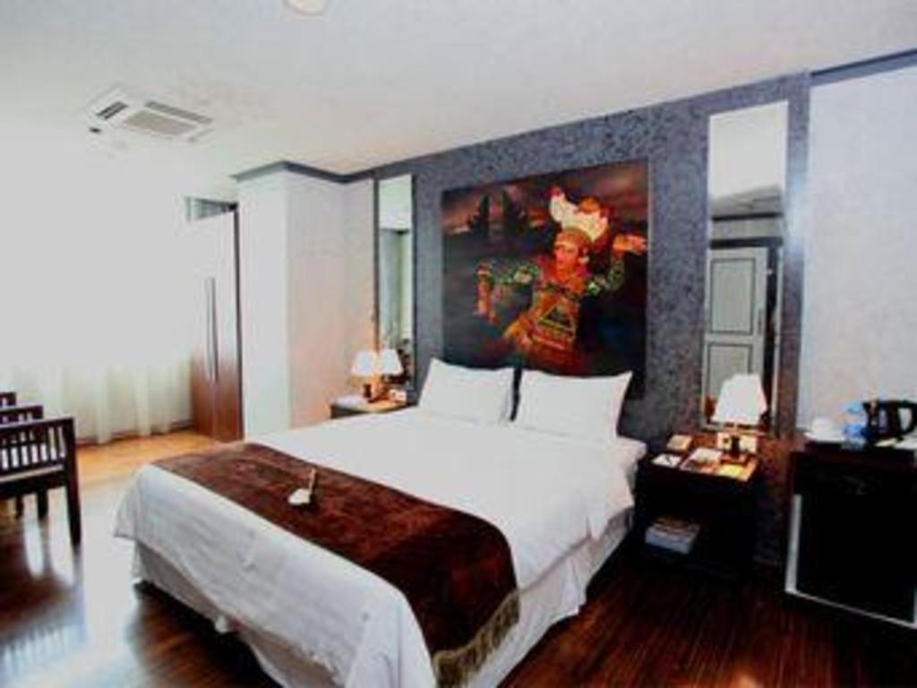 Amos Cozy Hotel Melawai Джакарта Экстерьер фото