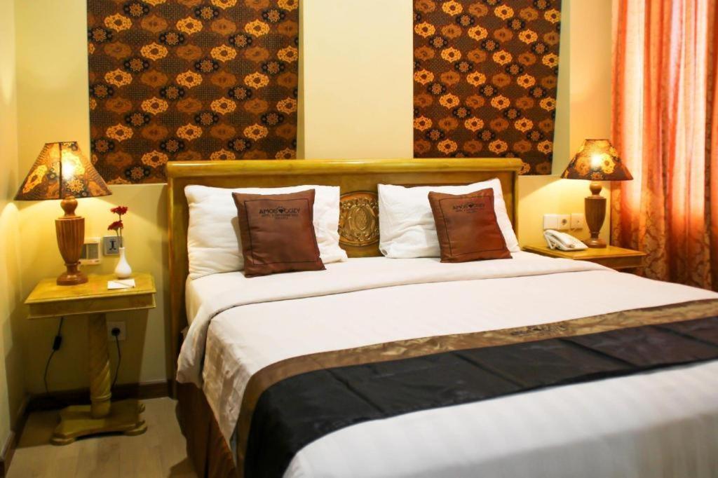 Amos Cozy Hotel Melawai Джакарта Экстерьер фото