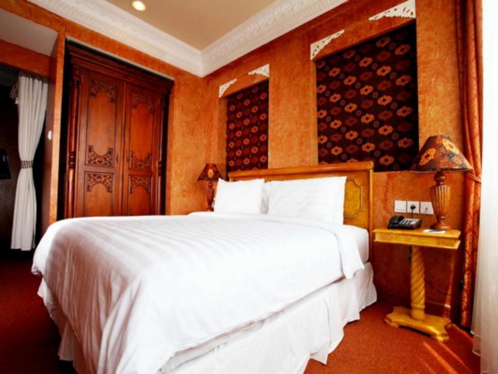 Amos Cozy Hotel Melawai Джакарта Экстерьер фото