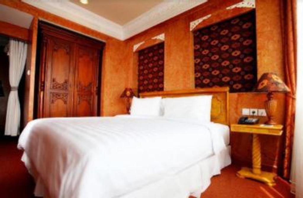 Amos Cozy Hotel Melawai Джакарта Экстерьер фото